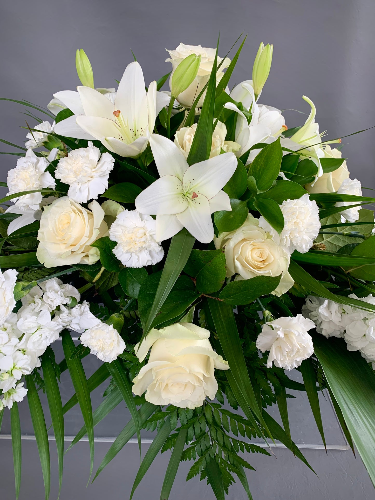 Close up 2 White Casket Spray North York Scarborough Florist delivery available