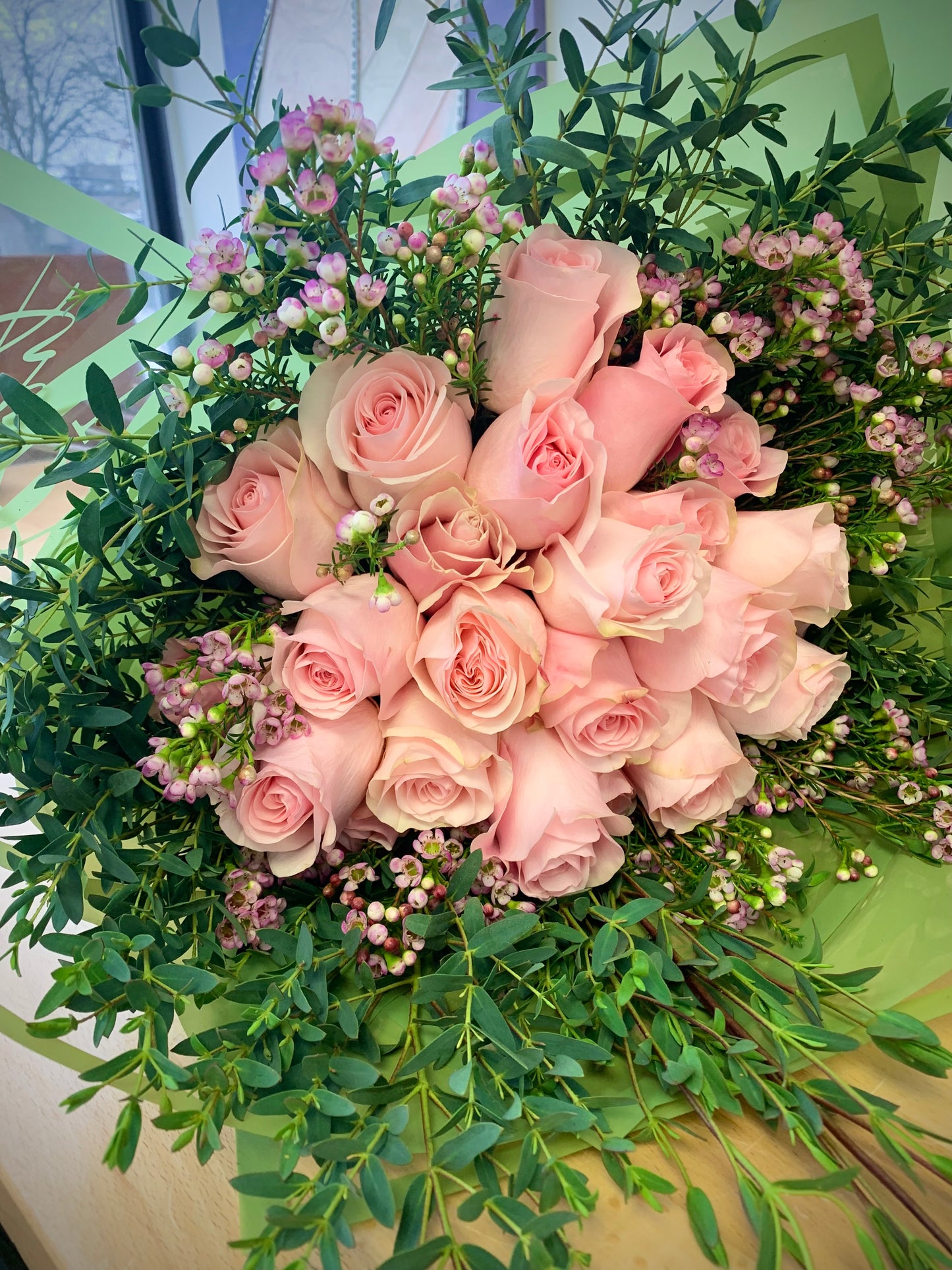 The Pink English Garden – 24 Pink Roses with Waxflower & Eucalyptus Halo