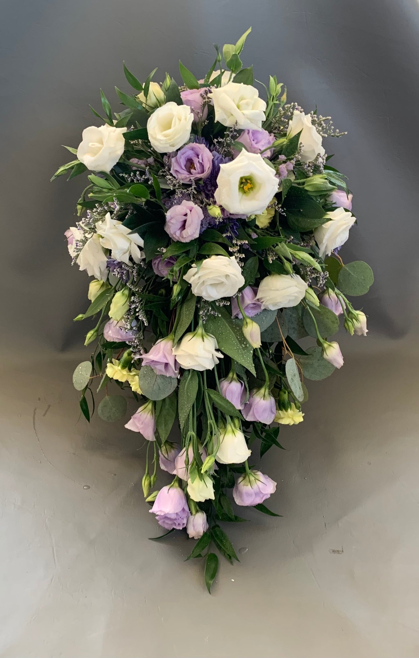 Loose cascading lisianthus bridal bouquet non-rose white and lavender