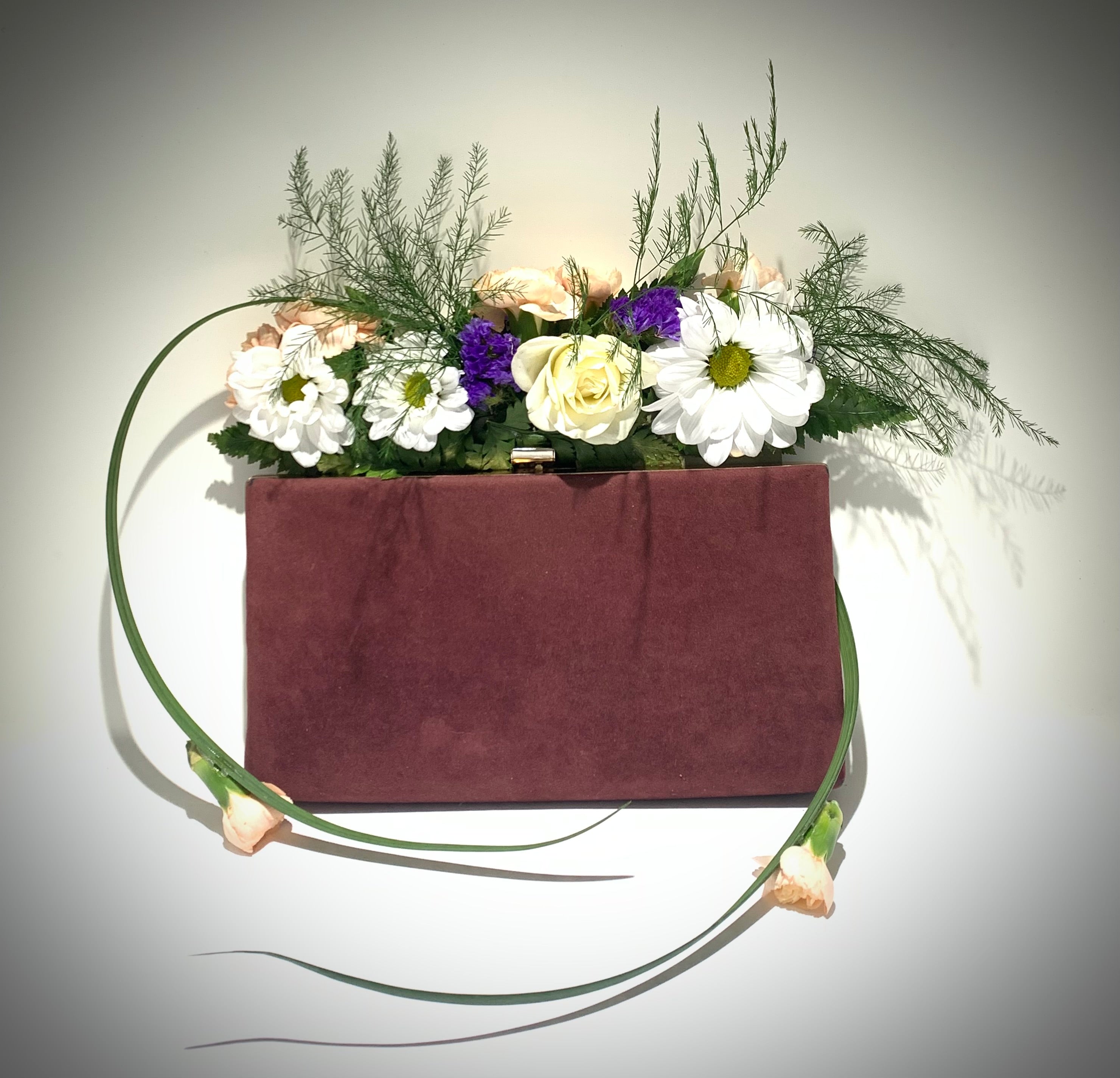 Fresh floral purse corsage for event or wedding