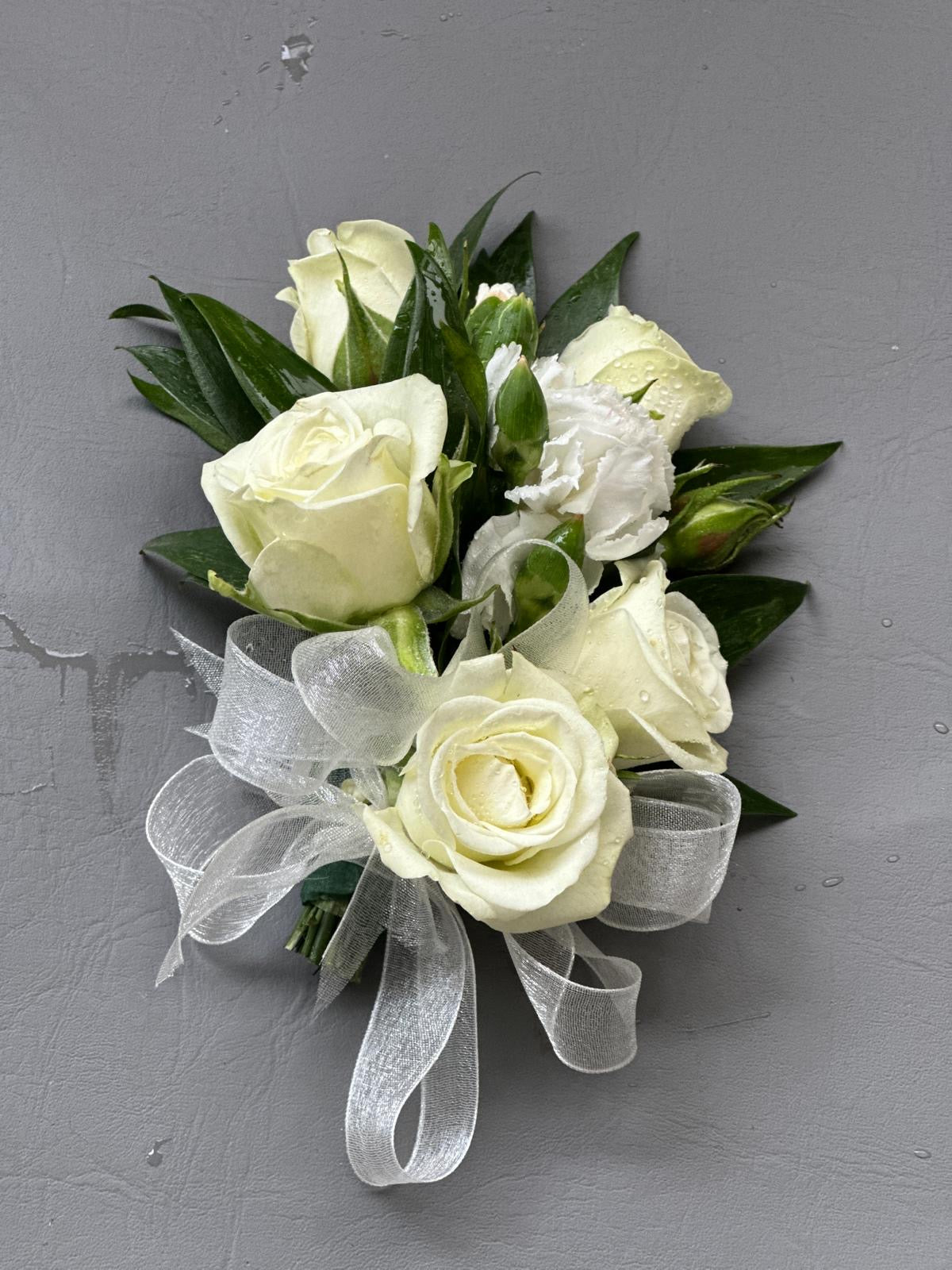 White wrist corsage with spray roses and ribbon for pick up or delivery in North York Scarborough Markham Toronto